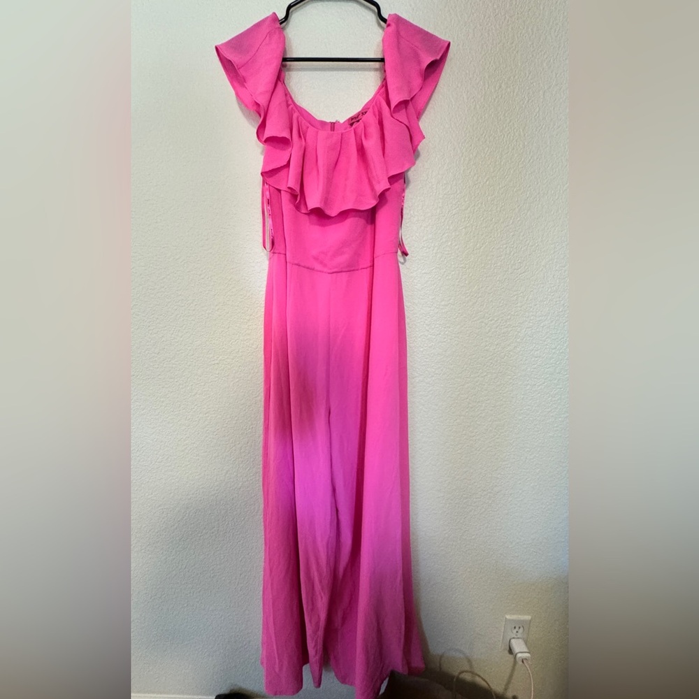 Pink Ruffled off shoulder jump suit.